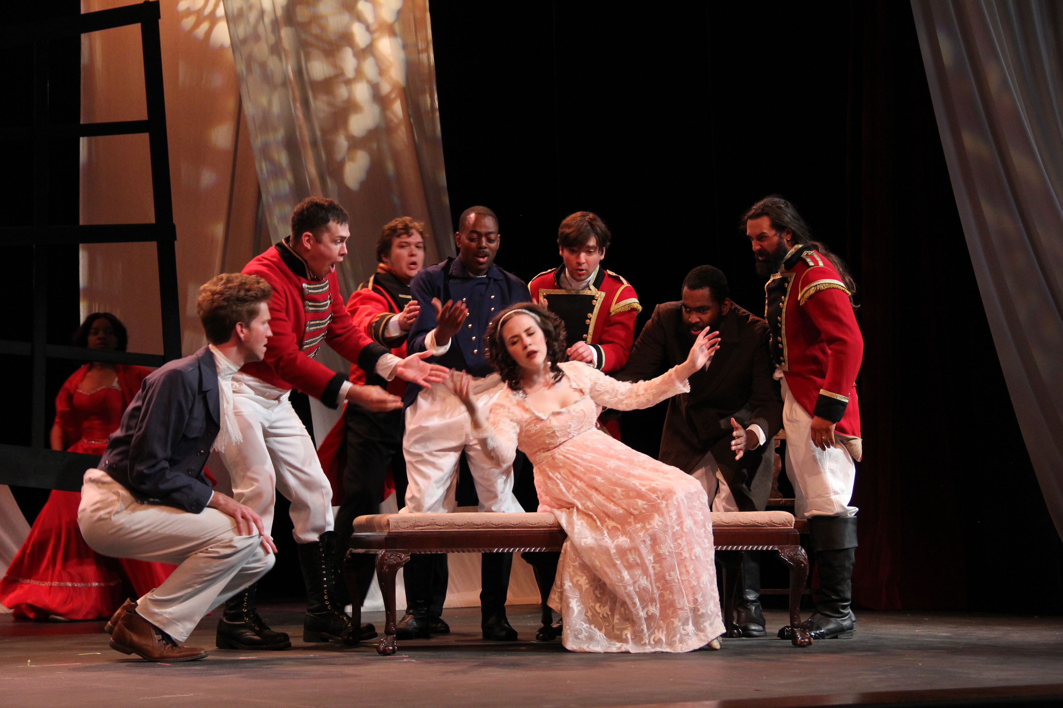 Phoebe fainting surrounded by men